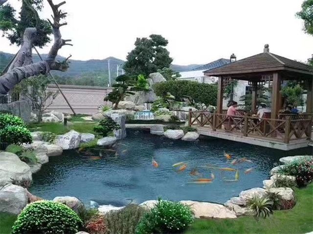 永川别墅庭院水池假山景观全景